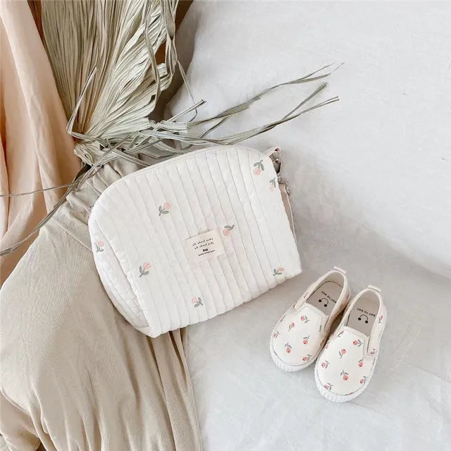 Quilted stroller and diaper organizer bag